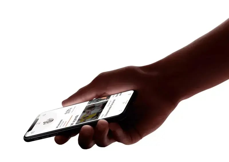 hands_holding_iPhone_11_Pro_mockup